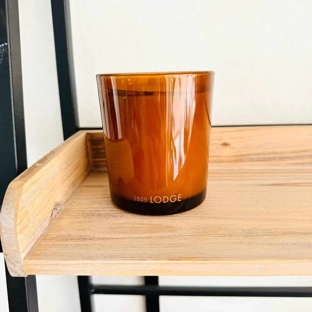NEW FP FREE PEOPLE Amber Rust Glass Vessel Lodge Palo Santo $48 Scented Candle